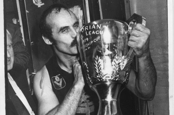 Carlton's Alex Jesaulenko kisses the 1979 premiership cup.