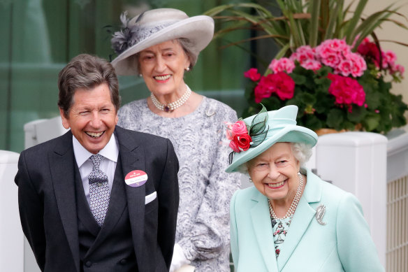 Lady-in-waiting Susan Hussey, standing behind the Queen and racing manager John Warren, at the Royal Ascot races in June 2021.
