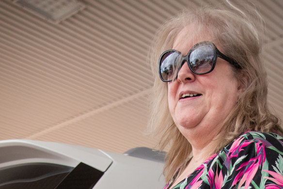 Healesville retiree Jackie Allen fills her car with petrol.