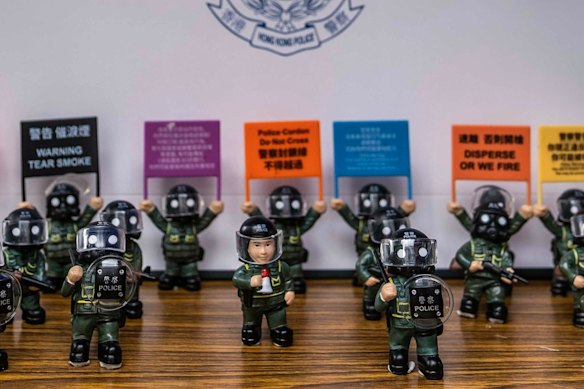 A merchandise table at the Hong Kong Police College in Hong Kong during National Security Education Day.