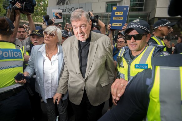 George Pell leaves the County Court in February.