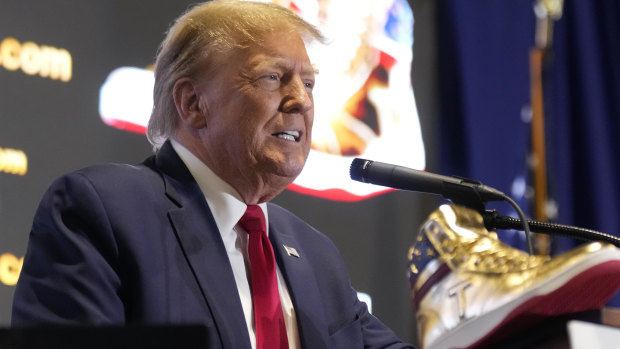 Trump heavily booed as he hawks $600 branded shoes at Sneaker Con