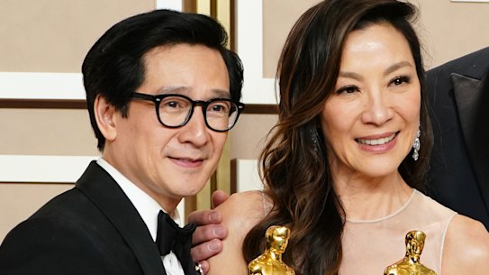Ke Huy Quan and Michelle Yeoh backstage at the Oscars.