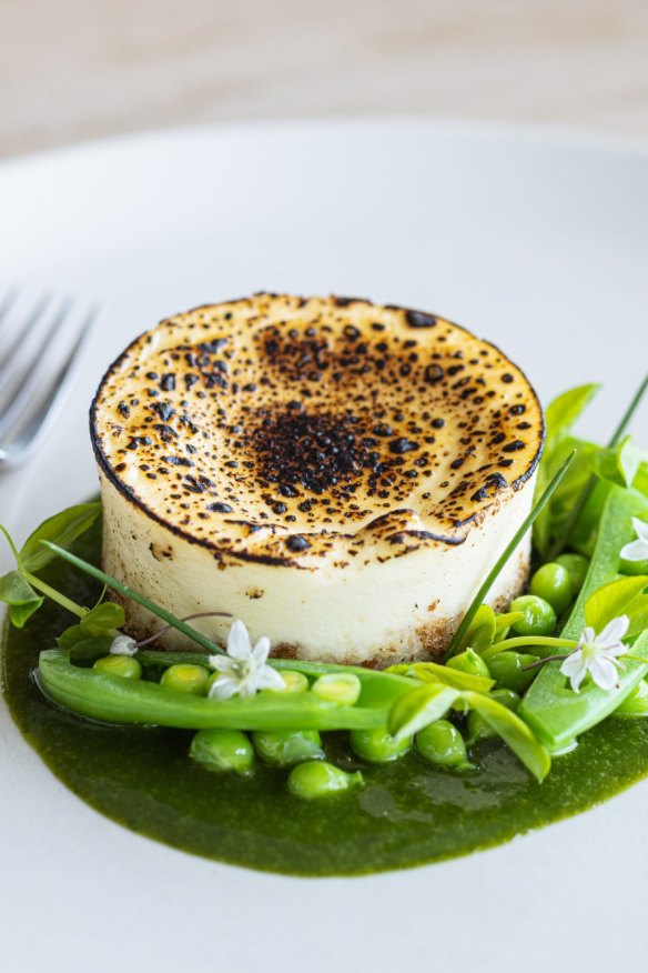 Basque cheesecake, charred greens and pea coulis.