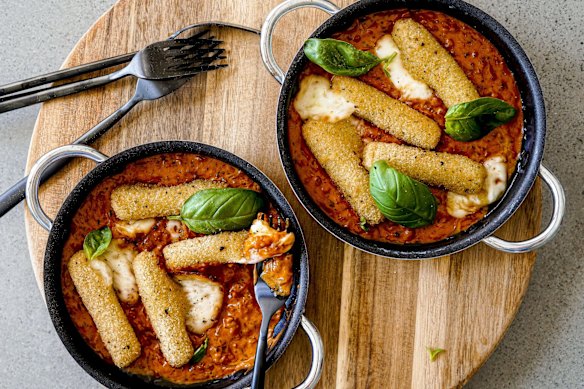 Mozzarella sticks swimming in creamy vodka and tomato sauce.