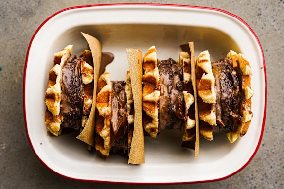 Waffles sandwiched with rum 'n' raisin 'n' rum ball ice-cream.