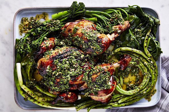Barbecued chicken with charred greens and chimichurri.
