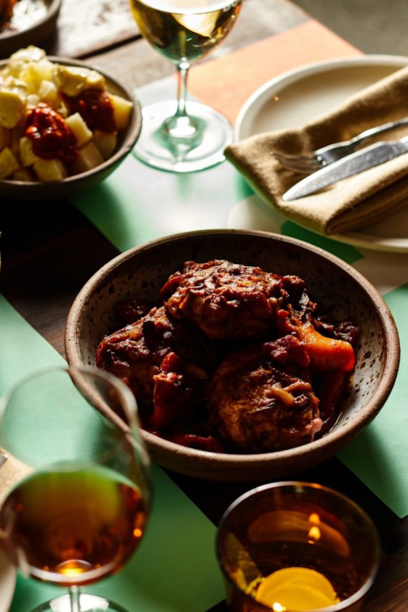 Chicken chilindron, gem lettuce salad and patatas bravas.