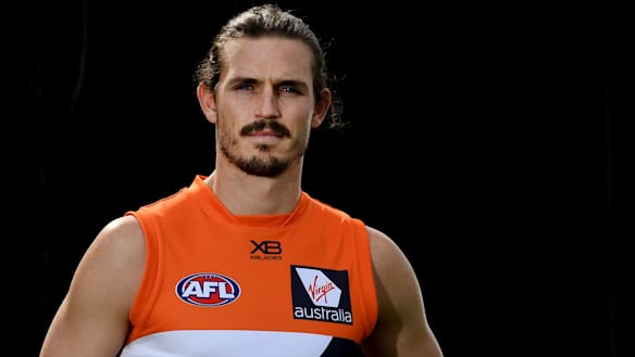 Phil Davis' football worlds collide in Canberra