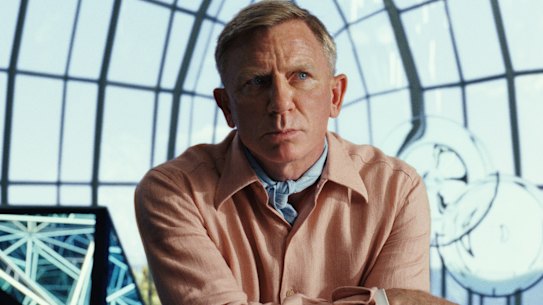 Daniel Craig returns as the debonair Detective Benoit Blanc in Glass Onion: A Knives Out Mystery.