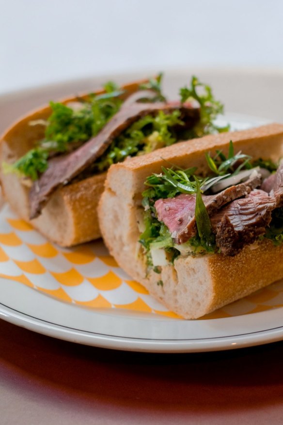 Roast beef roll with gribiche, pickled onions and endive.