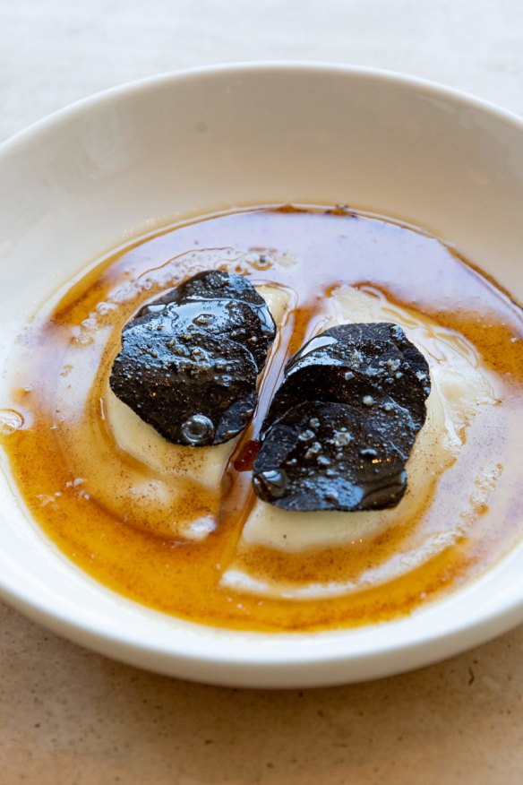 Potato dumplings, buffalo curd, whey, black truffle.