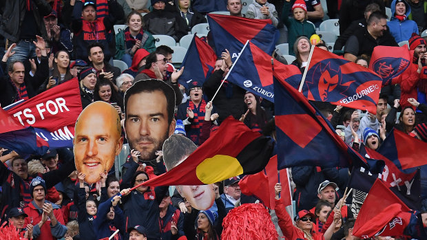 Plenty to cheer about: Melbourne fans out in force at the MCG for their round 23 clash against the Giants.