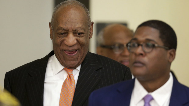 Bill Cosby returns from lunch during his sexual assault retrial at the Montgomery County Courthouse in Norristown, Pa.