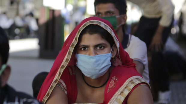 India on Friday ran the first train service for thousands of migrant workers desperate to return home since it imposed a nationwide lockdown to control the spread of the coronavirus. 