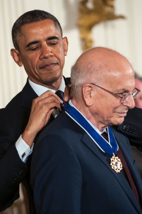 President Barack Obama presents the Presidential Medal of Freedom to psychologist Daniel Kahneman at a ceremony held at the White House on Nov. 20, 2013.