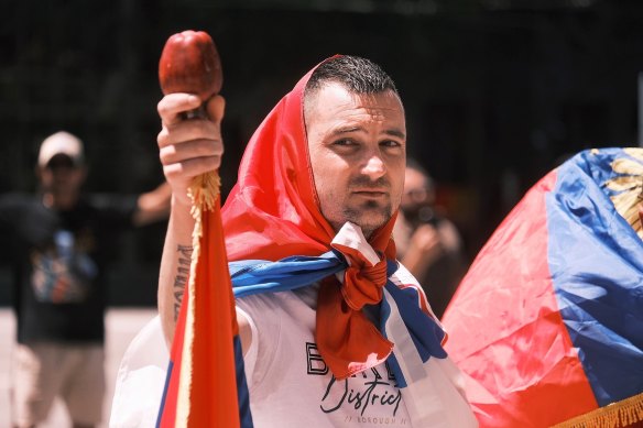 A supporter of Serbian tennis star Novak Djokovic outside the Federal Court on Sunday. 