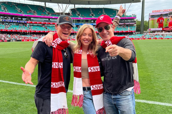 Sweeney with Anyone But You director Will Gluck and Dermot Mulroney at a Sydney Swans match.