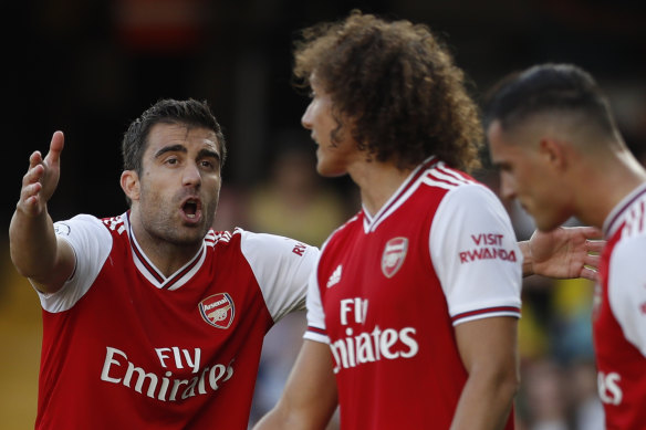 Arsenal's Sokratis Papastathopoulos yells at his teammates during their match against Watford at Vicarage Road on Sunday.
