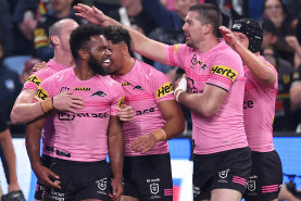 Happy cats: Penrith prevail for a ninth win straight win over the Roosters.