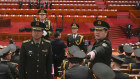 A military band prepares to perform at the opening session of the National People’s Congress.