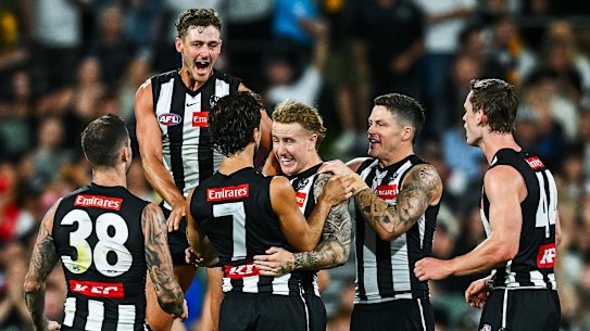 Beau McCreery in the thick of the action with his Magpies teammates.