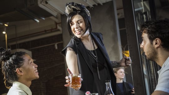 Smith & Daughters restaurant owner Shannon Martinez serving pre dinner aperitvo.