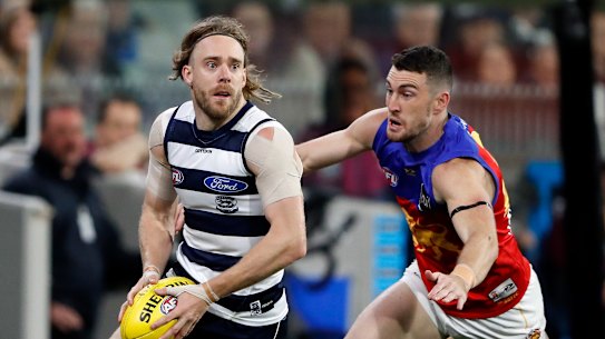 Daniel McStay chases Cam Guthrie.