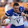 Jacob Kiraz of the Bulldogs is tackled during the round nine NRL match between the Gold Coast Titans and Canterbury Bulldogs at Suncorp Stadium.