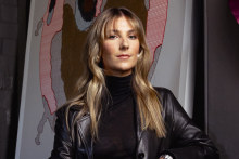 Shona McElroy at her studio in Paddington, Sydney. She wears a leather coat from Citizen Concept Store in Paris, Cos turtleneck, Zara jeans, Christian Louboutin shoes, earrings from Bottega Veneta and her Cartier Tank.