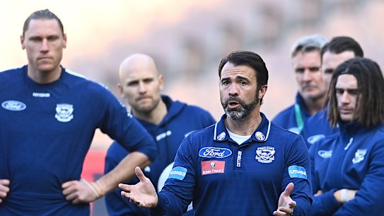 Pep talk: Cats coach Chris Scott speaks to his players during the round 4 clash against the Demons at the MCG.