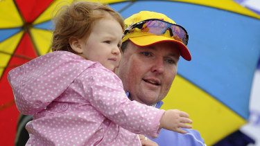 Jarrod Lyle, who died this week, holding his daughter Lusi in  2013.