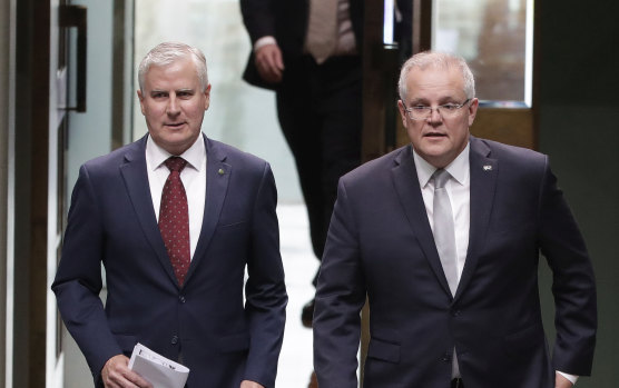 Michael McCormack and Scott Morrison say increased climate action will lead to 'higher taxes and higher electricity prices'.