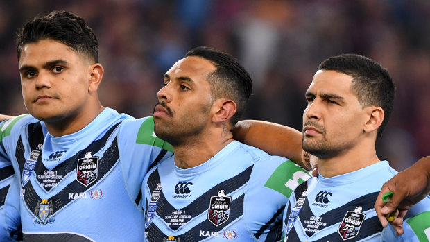 NSW stars Latrell Mitchell, Josh Addo-Carr and Cody Walker during the anthem before the State of Origin last year.