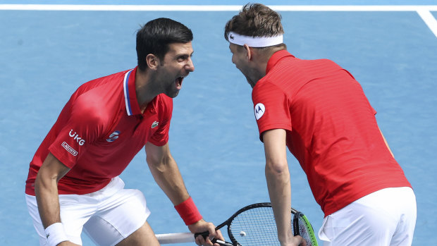 Serbia’s Novak Djokovic with doubles partner Filip Krajinovic.