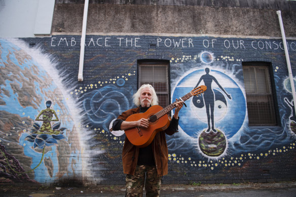 Unmasked local and musician Denis Pierre Johnson.