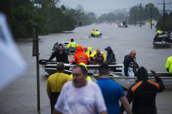 Lismore residents rally as the city is inundated by flood water. 