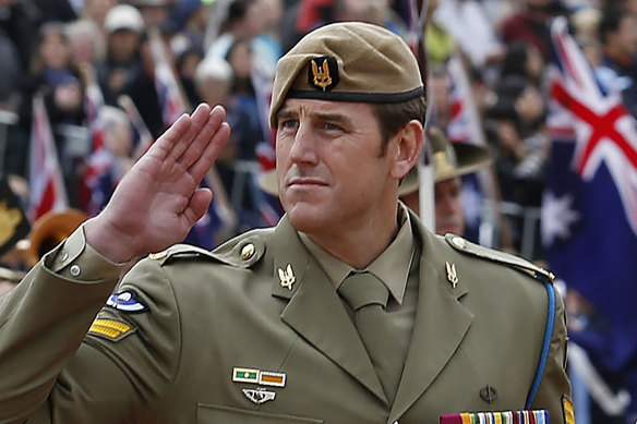 Ben Roberts-Smith marches past the saluting dais at the National ANZAC Day ceremony in Canberra.