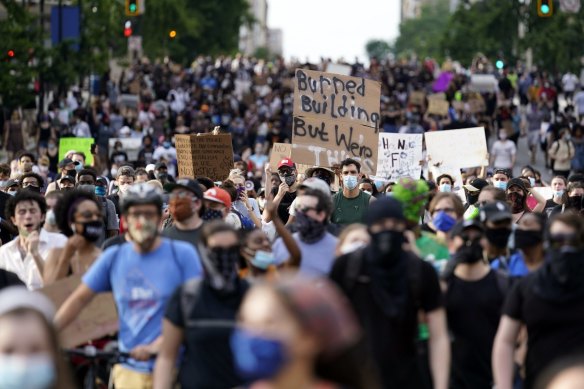 Thousands of demonstrators gather to protest the death of George Floyd in Minneapolis on Friday.