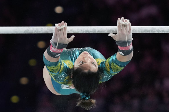 Georgia Godwin of Australia performs on the uneven bars during the women’s all-around finals.
