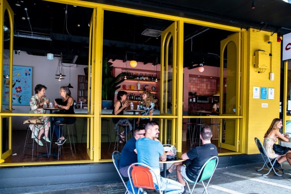 The outdoor tables at Cafe Freda’s are hot property.