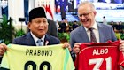 Indonesian President Prabowo Subianto and Prime Minister Anthony Albanese swap jerseys on Thursday.