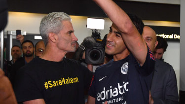 A jubilant Hakeem al-Araibi arrives home from captivity in Thailand on February 12 to be greeted by former Socceroo Craig Foster.