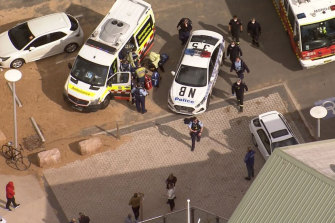 Emergency workers at Collaroy Beach on Monday. 
