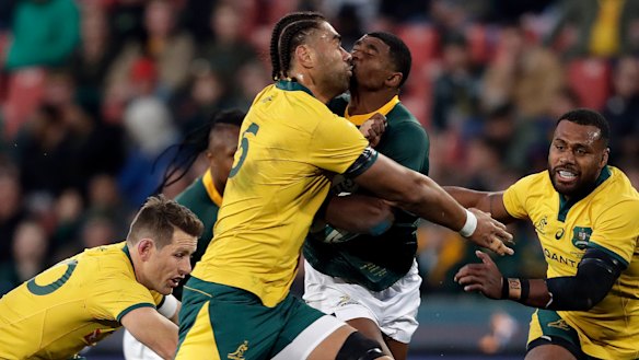 Defensive wall: South Africa's Warrick Gelant runs into Lukhan Salakaia-Loto at Ellis Park.