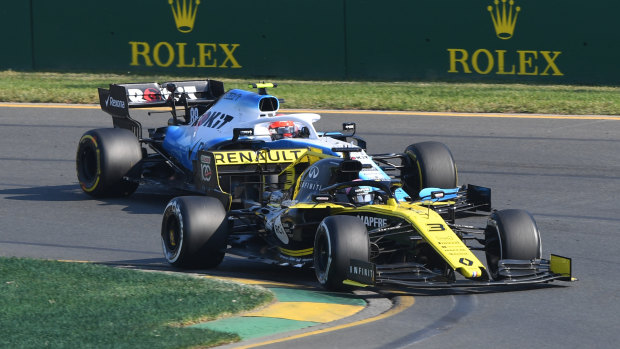 Promising signs: Australia's Daniel Ricciardo overtakes through turn one, before his Renault was forced to retire from the race.