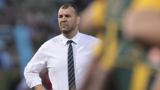Spray: Michael Cheika was seen giving the players a serve at halftime.