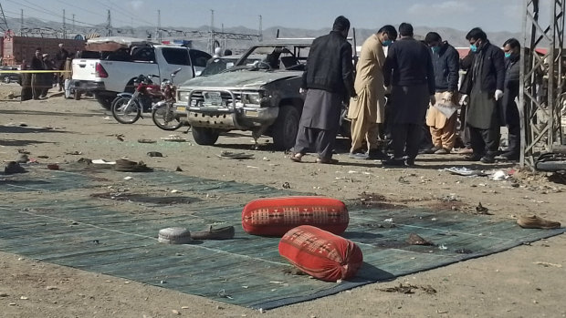 The scene of one of the bomb blasts before Pakistanis go to the polls.