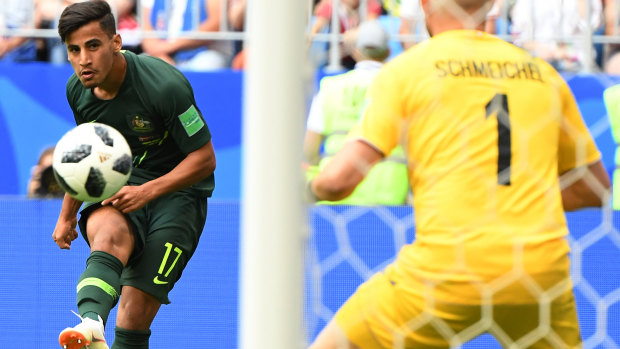 Audacious: Daniel Arzani strikes at goal against Denmark in the World Cup.