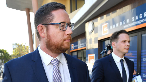 Angus Hutchings (left) leaving Southport courthouse on Monday.